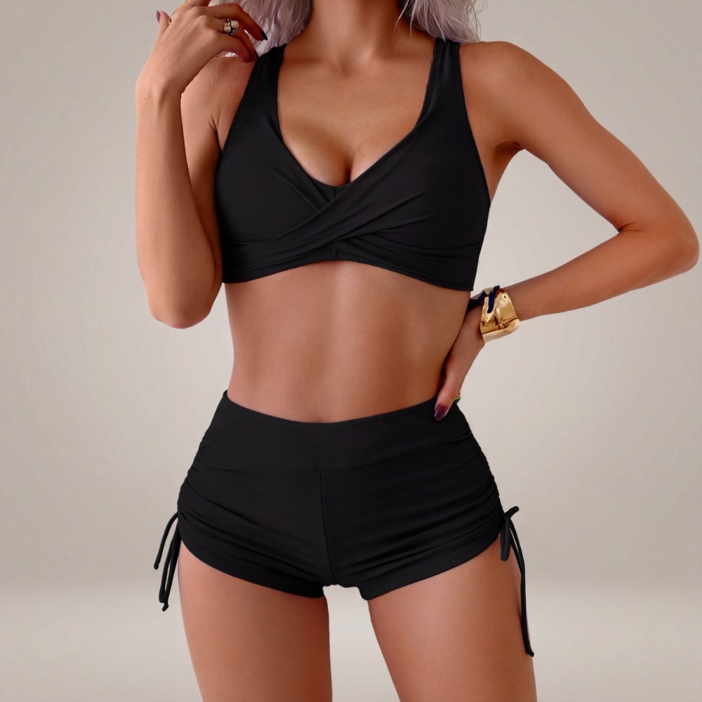 Раздельный купальник чёрный с шортиками и утягивающей посадкой 174-31 — вид вблизи Купить Раздельный купальник чёрный с шортиками и утягивающей посадкой 174-31 — реальное фото