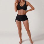 Раздельный купальник чёрный с шортиками и утягивающей посадкой 174-31 — вид вблизи Купить Раздельный купальник чёрный с шортиками и утягивающей посадкой 174-31 — реальное фото